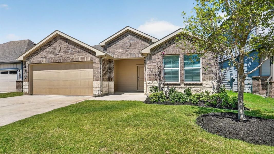 Representative exterior photo of a completed home built from the Dove by D.R. Horton in Rock Creek West, Fort Worth, TX (Image 2).