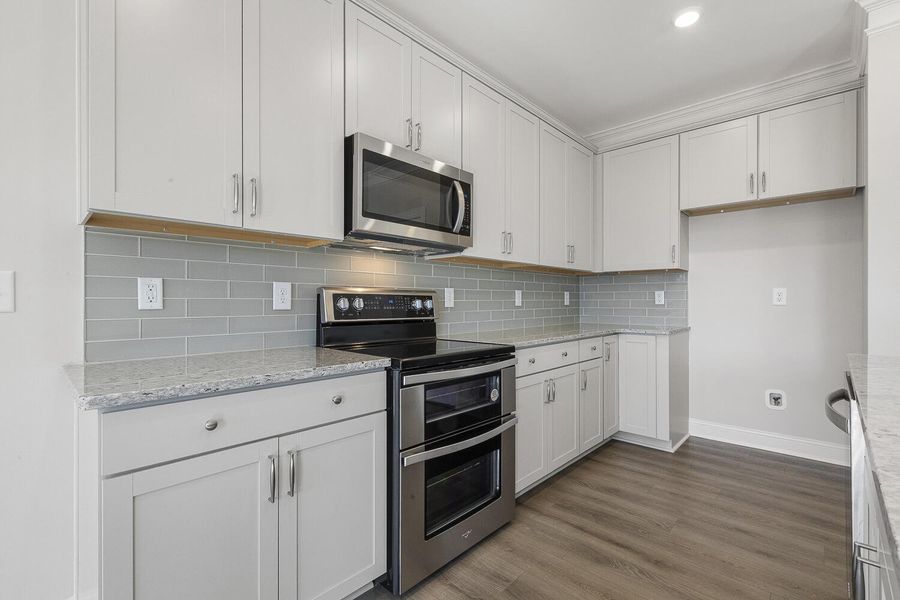 Furnished interior view inside a new home in 1158 Place, Wilson (Image 11).
