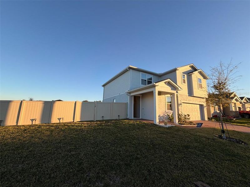 Exterior details and patio area of a home in Waterbrooke, Clermont (Image 29).