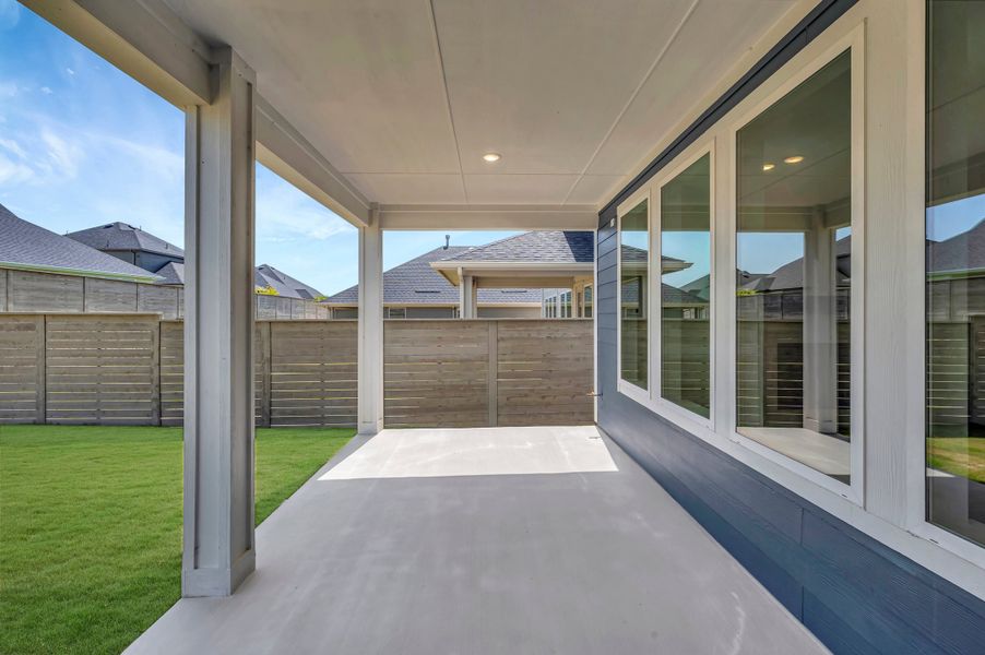 Exterior details and patio area of a home in Treeline, Justin (Image 4). Exterior details and patio area of a home in Treeline, Justin (Image 4).