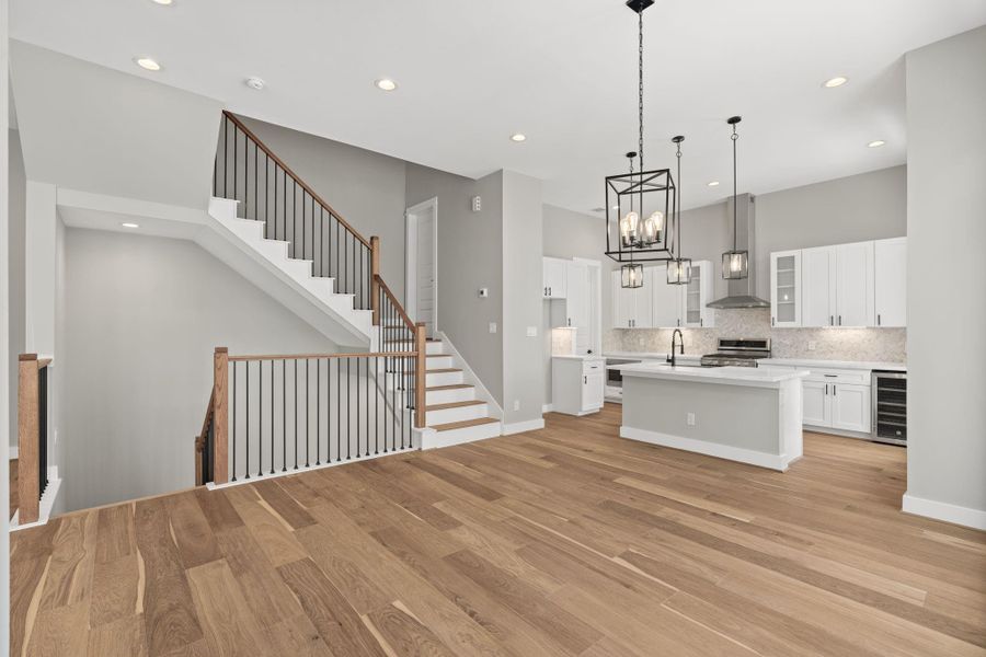 Enjoy the incredible natural light that shines through this living and kitchen space.