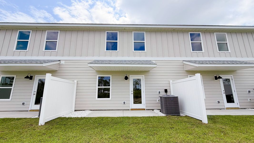 Exterior details and patio area of a home in WindMark Beach, Port Saint Joe (Image 3).