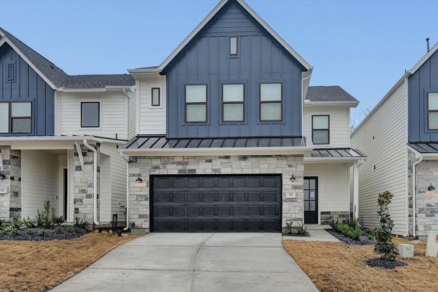 Front exterior of a new home in Summer Place  35', Montgomery, TX, highlighting curb appeal (Image 28).