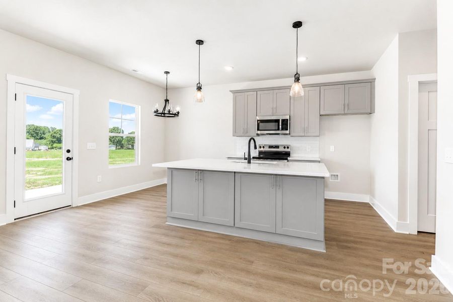 Furnished interior view inside a new home in , Statesville (Image 7).