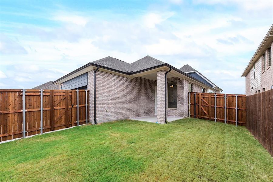 Exterior details and patio area of a home in Edgewater, Royse City (Image 25). Exterior details and patio area of a home in Edgewater, Royse City (Image 25).
