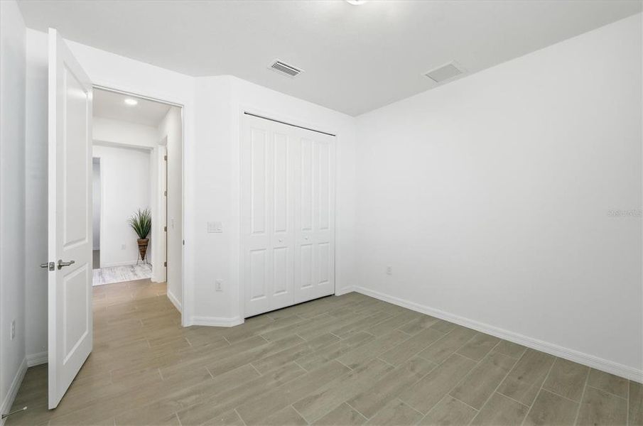 Spacious, unfurnished interior of a new home in Heritage Landing, Punta Gorda (Image 46).