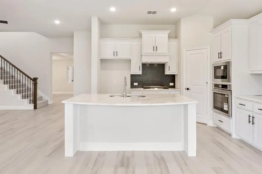 Furnished interior view inside a new home in Devonshire, Forney (Image 8).