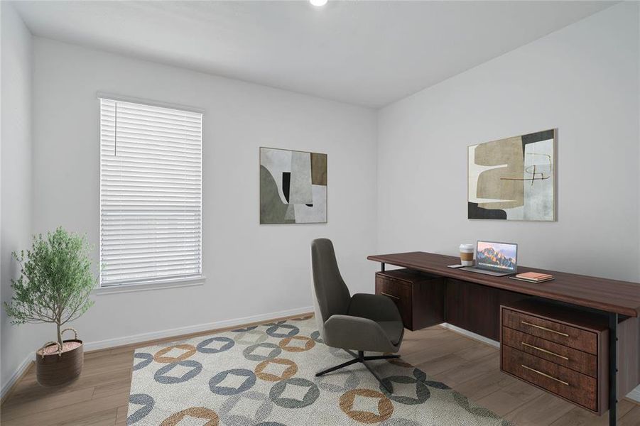 Quietly nestled in front of the home is the handsome den that is used here as a home office. Featuring gorgeous flooring, custom paint and a large window.