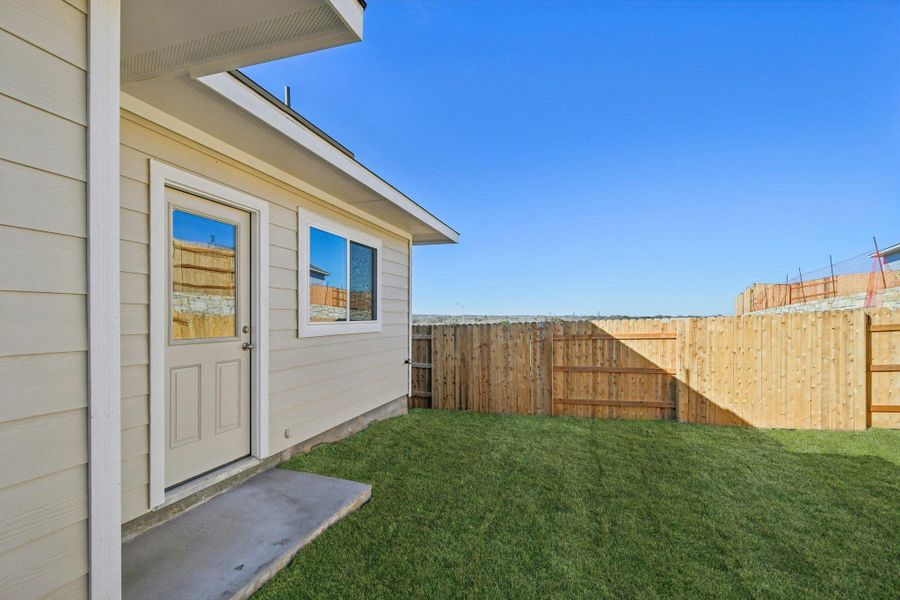 Rear of Home and Private Backyard