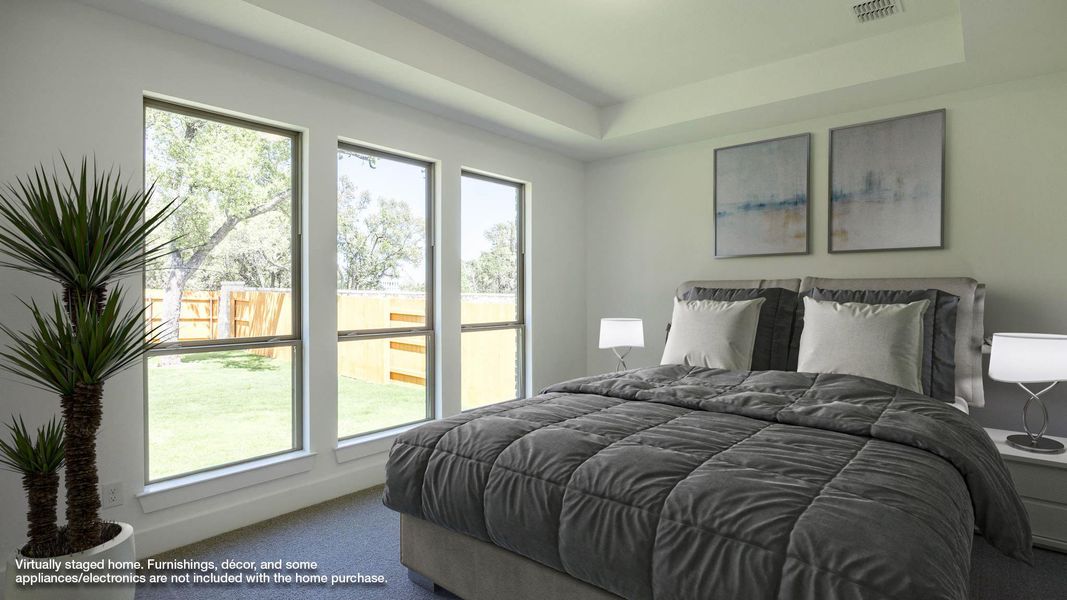 Bedroom with multiple windows, carpet, and visible vents Bedroom with multiple windows, carpet, and visible vents
