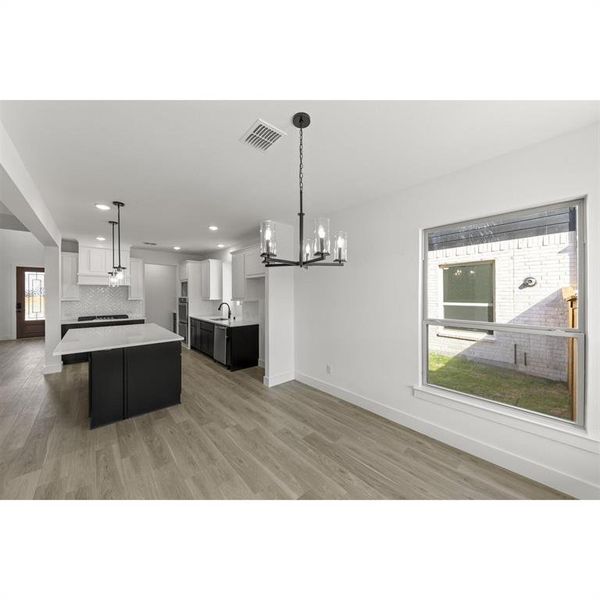 Furnished interior view inside a new home in Trails at Cottonwood Creek, Rowlett (Image 12).