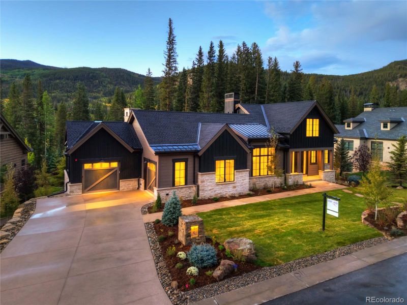 Front exterior of a new home in , Keystone, CO, highlighting curb appeal (Image 25).