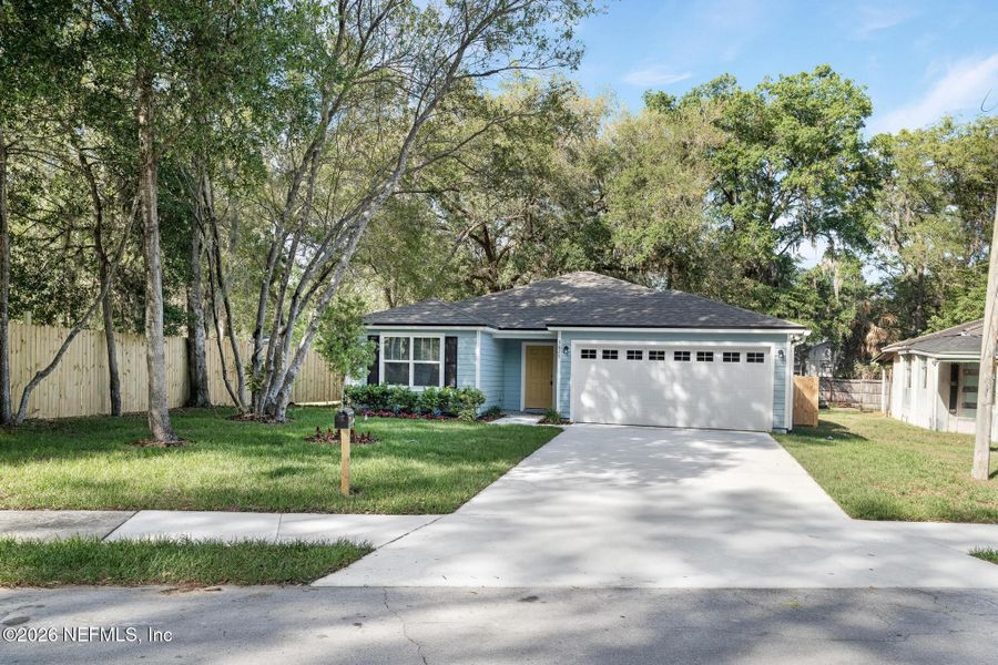 Front exterior of a new home in , Jacksonville, FL, highlighting curb appeal (Image 24).