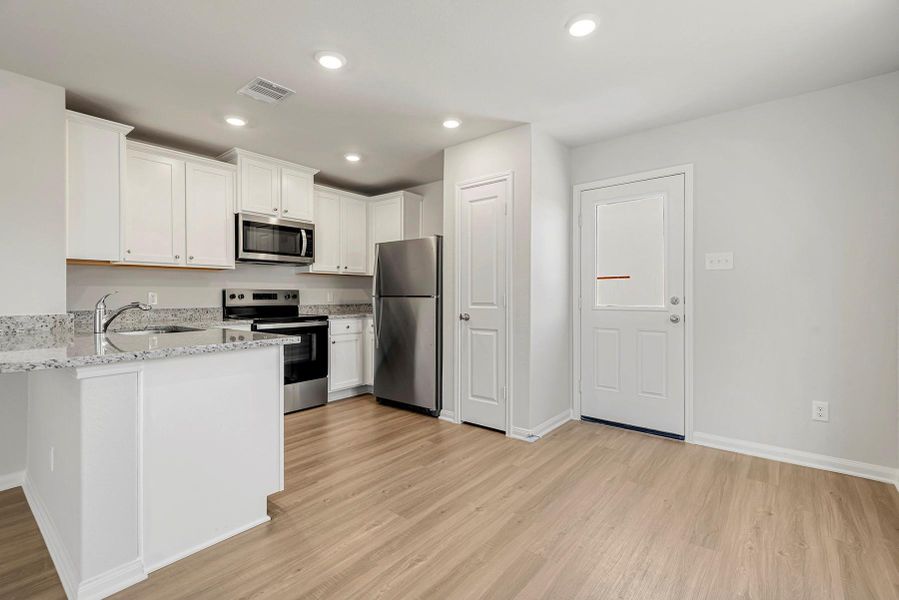 Furnished interior view inside a new home in Wayside Village, Houston (Image 3).