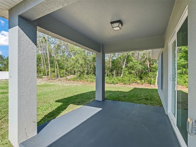 Exterior details and patio area of a home in , Ocala (Image 24).