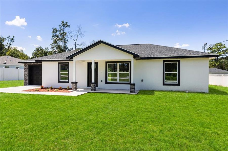 Exterior details and patio area of a home in , Ocala (Image 18).