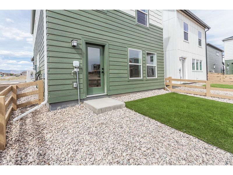 Exterior details and patio area of a home in Bloom Trailblazer Collection - Single Family Homes, Fort Collins (Image 24).