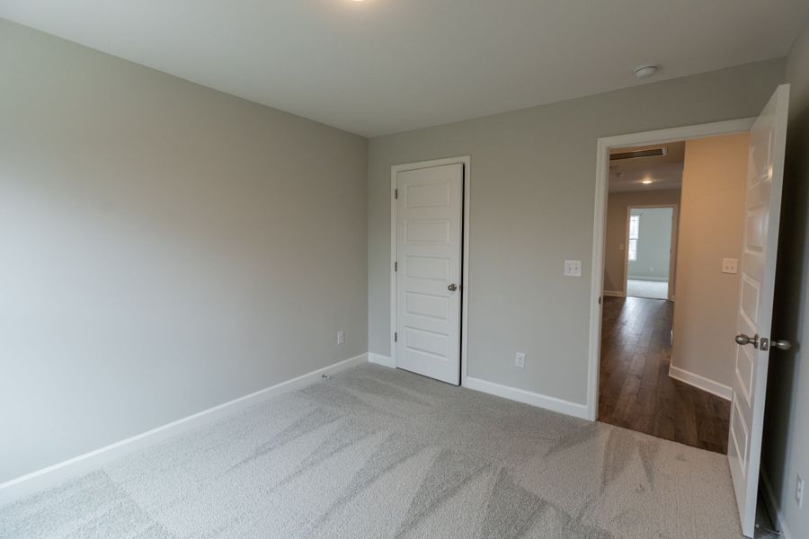Representative unfurnished interior of a home built from the Dalton by Parkside Builders in The Woods, Gallatin (Image 21).