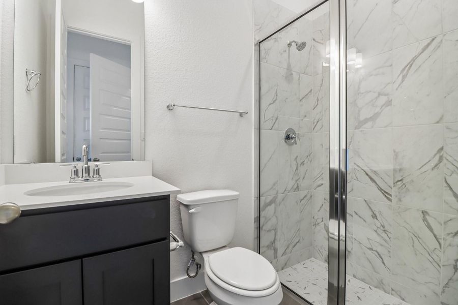 Furnished interior view inside a new home in The Grand Prairie 60', Hockley (Image 11).
