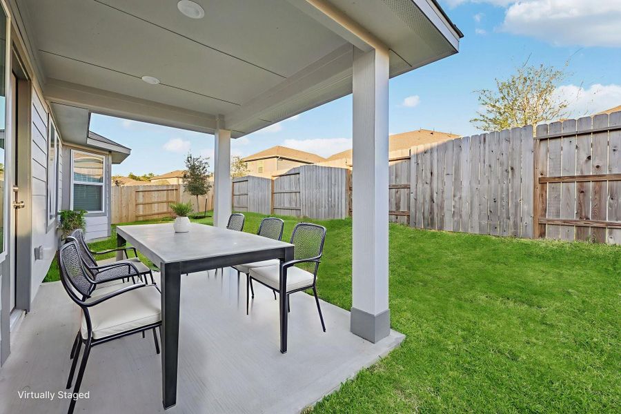 Exterior details and patio area of a home in Stewart's Ranch, Conroe (Image 23).