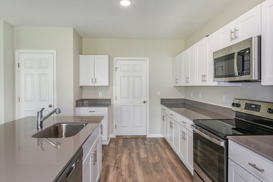 Furnished interior view inside a new home in Scenic Terrace, Haines City (Image 6).