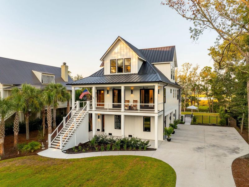 Front exterior of a new home in , Awendaw, SC, highlighting curb appeal (Image 18). Front exterior of a new home in , Awendaw, SC, highlighting curb appeal (Image 18).