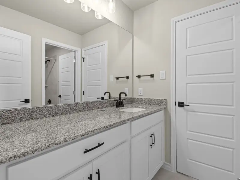 Furnished interior view inside a new home in The Reserve at Potranco Oaks, Castroville (Image 18).