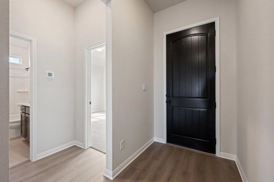 Spacious, unfurnished interior of a new home in The Colony 50s, Bastrop (Image 21).
