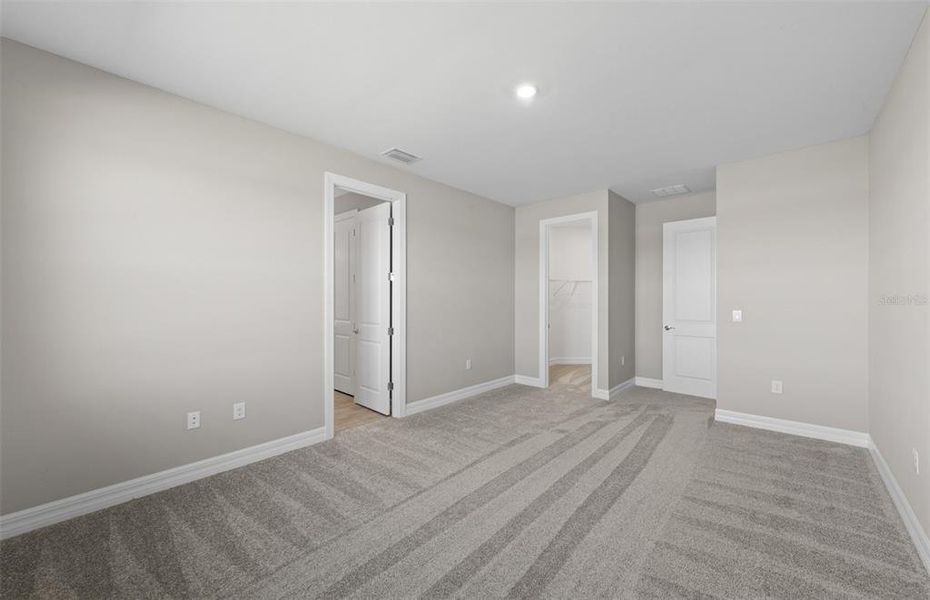 Spacious, unfurnished interior of a new home in The Strand at Cedar Grove, North Port (Image 27).