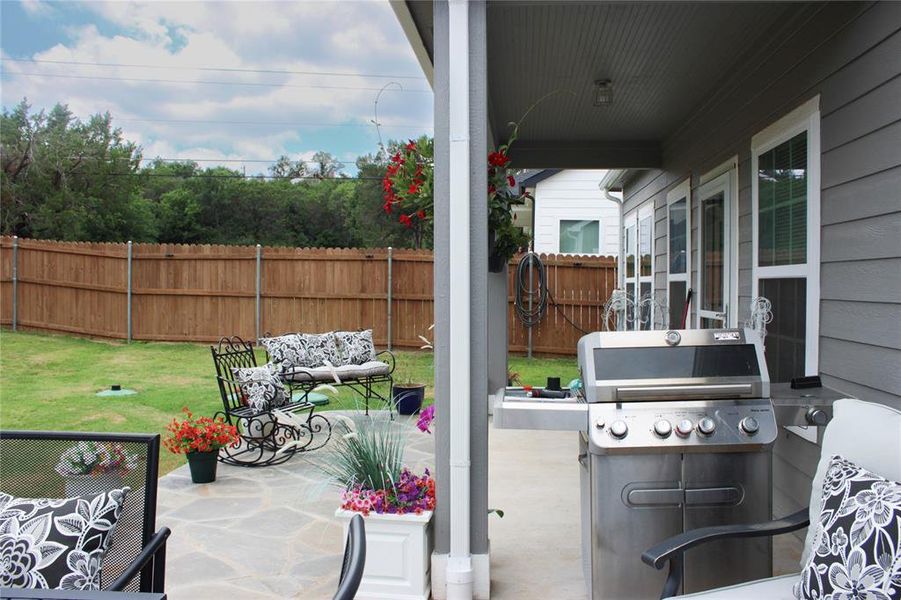 Exterior details and patio area of a home in , Granbury (Image 23).