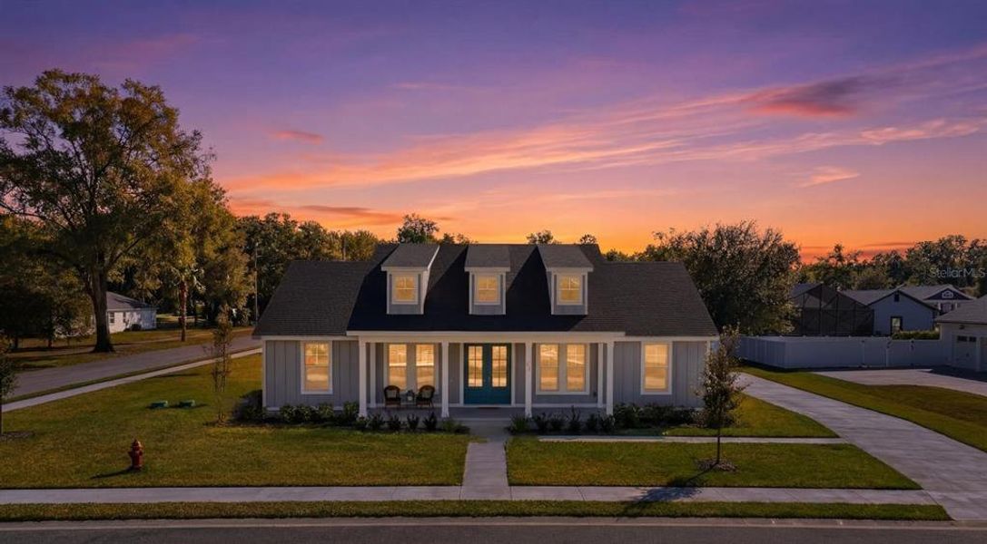 Front exterior of a new home in , Lake Helen, FL, highlighting curb appeal (Image 2).