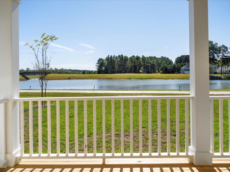Exterior details and patio area of a home in The Coves at Lakes of Cane Bay II, Summerville (Image 25).