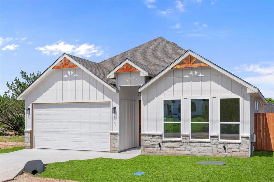 Front exterior of a new home in , Granbury, TX, highlighting curb appeal (Image 8). Front exterior of a new home in , Granbury, TX, highlighting curb appeal (Image 8).