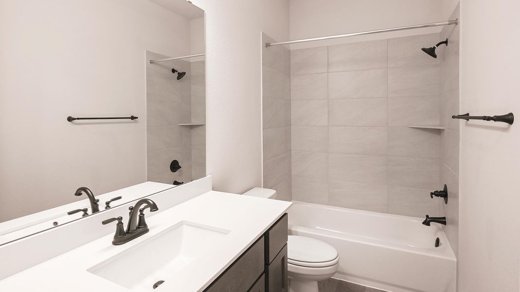 Furnished interior view inside a new home in 6 Creeks, Kyle (Image 7).