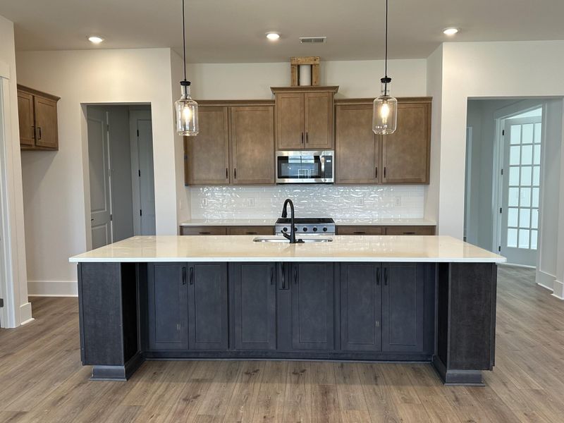 Furnished interior view inside a new home in Summerwind Crossing at Lakes of Cane Bay, Summerville (Image 8).