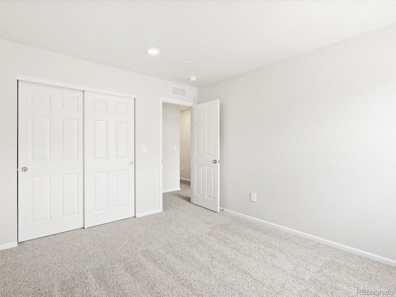 Spacious, unfurnished interior of a new home in Poudre Heights: The Meadow Collection, Windsor (Image 9).