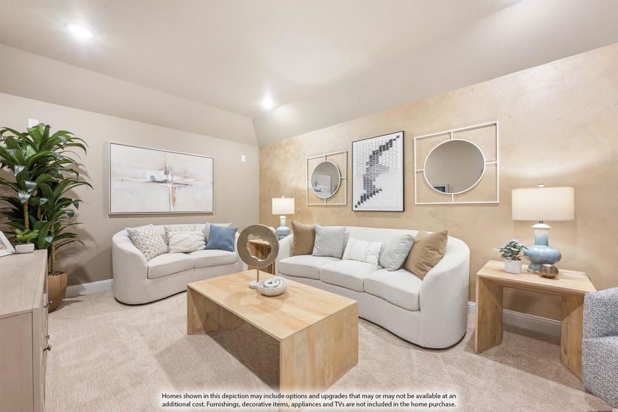 Living room with two white curved sofas, wood coffee table, vaulted ceiling, and decorative wall mirrors on beige accent wall