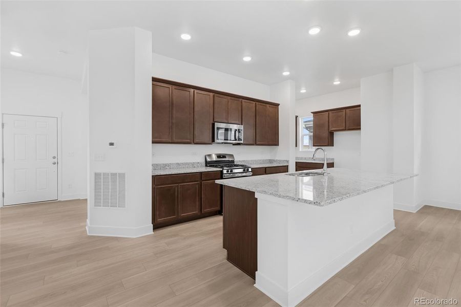 Furnished interior view inside a new home in Painted Prairie Cottage, Aurora (Image 14).