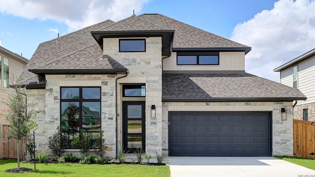 Front exterior of a new home in Ladera, San Antonio, TX, highlighting curb appeal (Image 2).