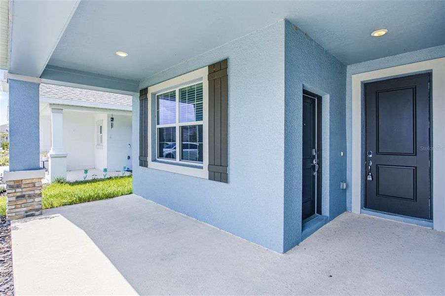 Exterior details and patio area of a home in Peace Creek Reserve, Winter Haven (Image 24).