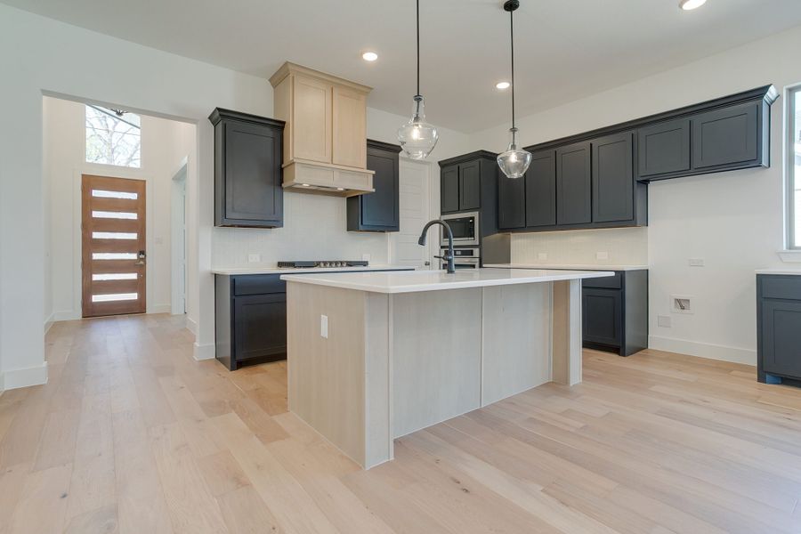Representative furnished interior of a home built from the Longview by Graham Hart Home Builder in Bear Ridge, Burleson (Image 13).