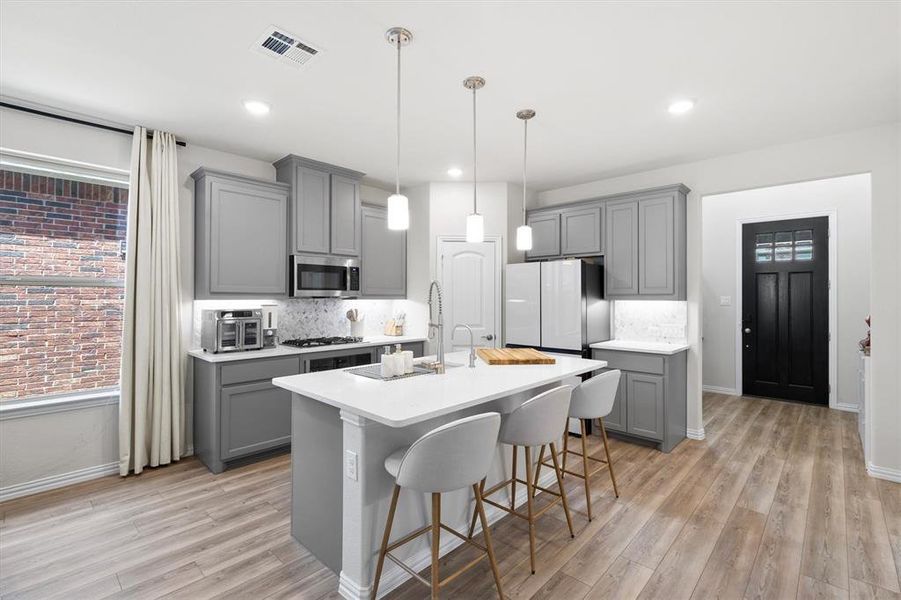 Furnished interior view inside a new home in Riverset, Garland (Image 8). Furnished interior view inside a new home in Riverset, Garland (Image 8).