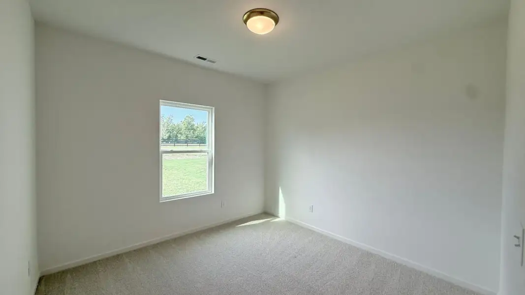 Spacious, unfurnished interior of a new home in Nathans Ridge, Lillington (Image 9).