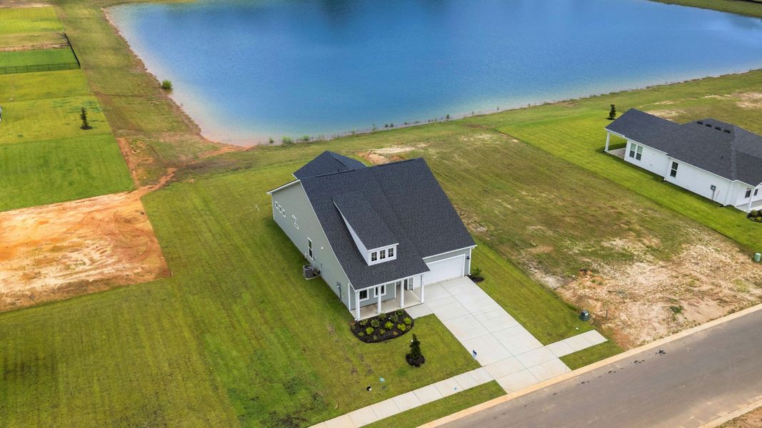 Representative exterior photo of a completed home built from the Chelsea by DRB Homes in Chestnut Farms, Longs, SC (Image 23). Representative exterior photo of a completed home built from the Chelsea by DRB Homes in Chestnut Farms, Longs, SC (Image 23).