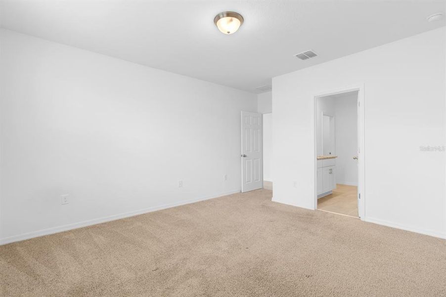 Spacious, unfurnished interior of a new home in Lawson Dunes - Signature Series, Haines City (Image 22).