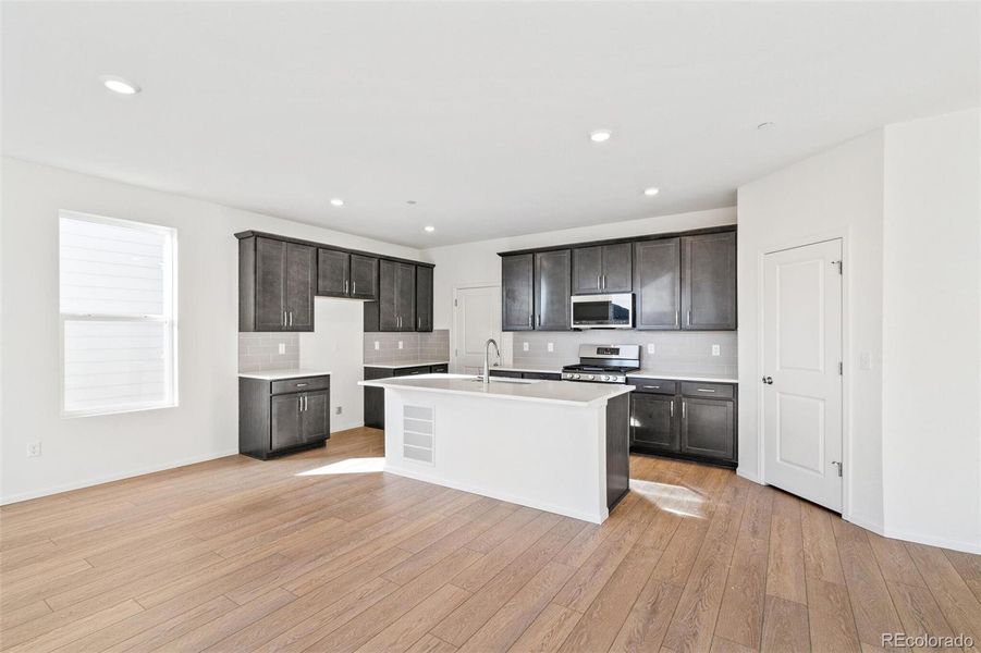 Furnished interior view inside a new home in Turnberry, Commerce City (Image 9).