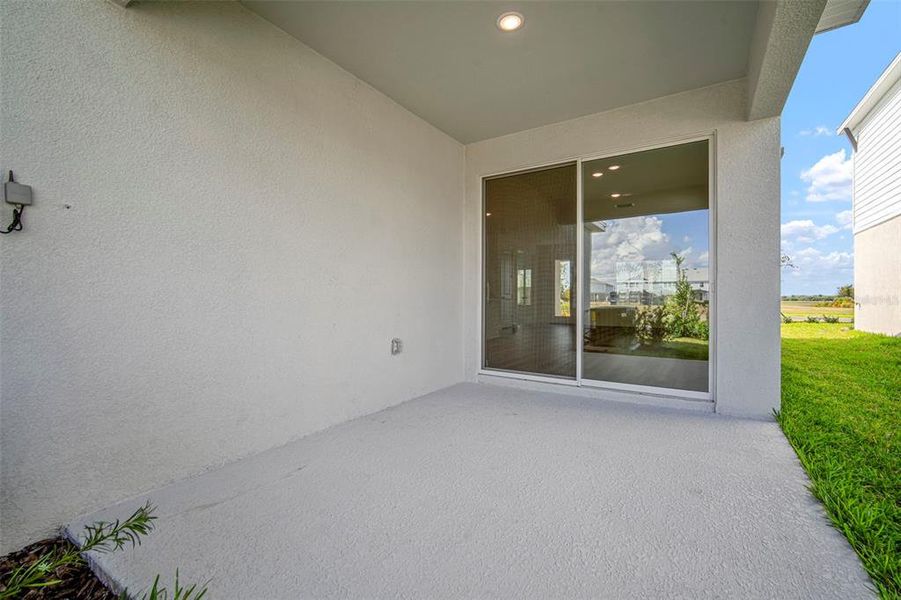 Exterior details and patio area of a home in North River Ranch, Parrish (Image 3).