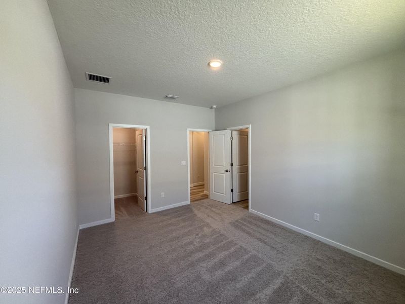 Spacious, unfurnished interior of a new home in The Magnolia Series at Reserve East, Flagler Beach (Image 15).