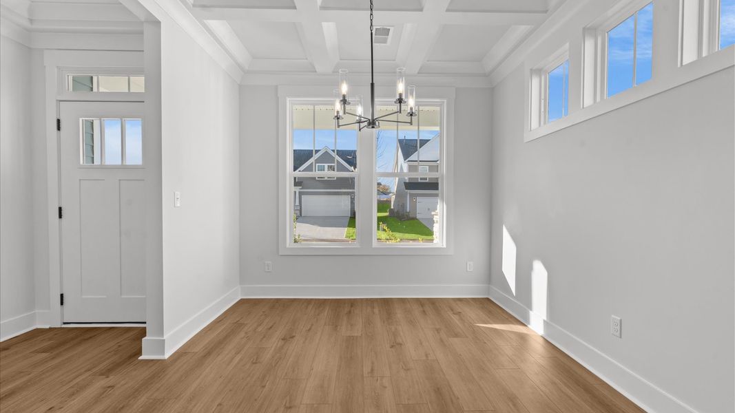 Superior craftsmanship seen in every corner especially the coffered ceiling of this elegant dining space Superior craftsmanship seen in every corner especially the coffered ceiling of this elegant dining space