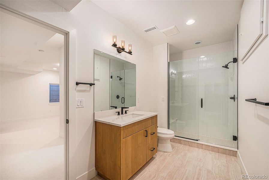 En suite bathroom in finished basement